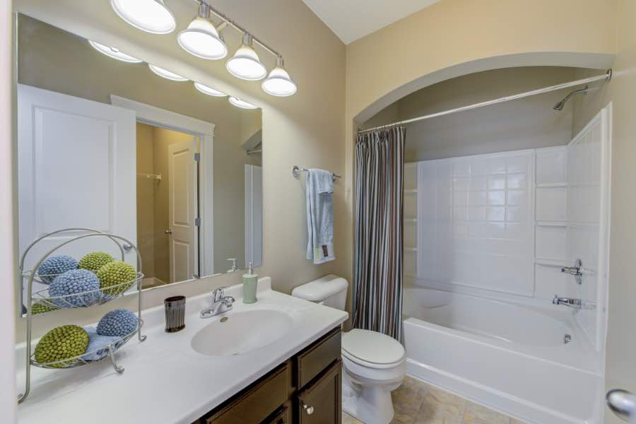 Full bath with vanity in apartment